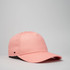A pink UFlex Adults Pro Style 5 Panel Snapback cap with a logo on the side.