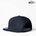 A navy blue snapback cap featuring a branded logo and a flat brim.