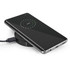 A sleek black wireless charger with a smartphone displaying a charging percentage on top.