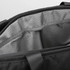A black cooler bag with a grey, lined interior featuring compartments for organising items.