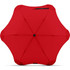A red BLUNT Metro Umbrella with a unique rounded design and a central button, featuring a logo.