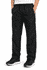 A pair of black track pants for kids with an elastic waistband and pockets, worn with black sneakers.