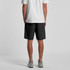 Active training shorts in black, featuring a logo, modelled from the back, paired with a white t-shirt and grey sneakers.