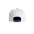 A two-tone cap featuring a white front and a blue back with an adjustable strap and a logo.