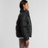 A black puffer jacket with a high collar and a fitted silhouette, displayed from the side on a model.