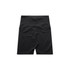 Black active bike shorts with a fitted design, featuring a logo and structured waistline.