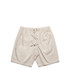 Beige dress shorts with an elastic waistband, drawstring, and side pockets. Includes a logo on the waistband.