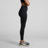A pair of black seamless leggings displayed on a model, featuring a high waist and fitted design.