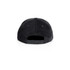 A black cap with a corduroy texture featuring an adjustable snapback closure and a branded logo.