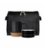 A black espresso coffee cup with a cork base and a matching speaker, placed in a black zippered pouch.