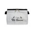 A white zippered bag with a decorative design featuring the words "Casa Mi Amore."