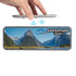A portable speaker and inductive charger with a scenic mountain landscape design and a logo. Predominantly grey with blue and green hues.