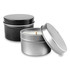 Two tin candles are displayed, one black with a lid and one silver with the lid off, showcasing the white wax inside.