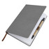 A5 textured grey PU notebook with a pen resting beside it, featuring a ribbon bookmark and lined pages inside.