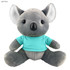 A grey koala plush toy wearing a light blue shirt, featuring a black nose and soft ears, with a branding logo.