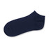 Navy ankle sock with a seamless design and a round toe. Features a branding logo on the side.