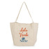 A cream tote bag with a logo and text that reads "Isla Verde Suite."