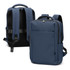A soft-touch daily backpack in navy blue with padded straps and a logo. Features a sleek design and multiple compartments.