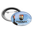 An oval button badge featuring a scenic design with a person on a mountain and a logo, in vibrant colours.