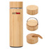 A drink bottle made of bamboo with a natural finish, featuring a removable lid and an attached handle.