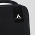 A black travel backpack with a tag featuring a logo. The fabric appears textured and durable.