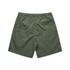 Green sports shorts featuring a back pocket and an elastic waistband. Includes branding.