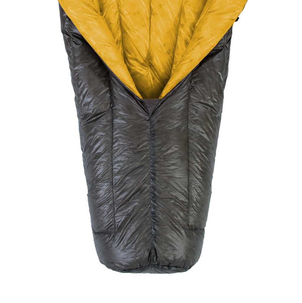 close up view of a opened up view of a charcoal shell lightweight down sleeping bag quilt with a yellow interior