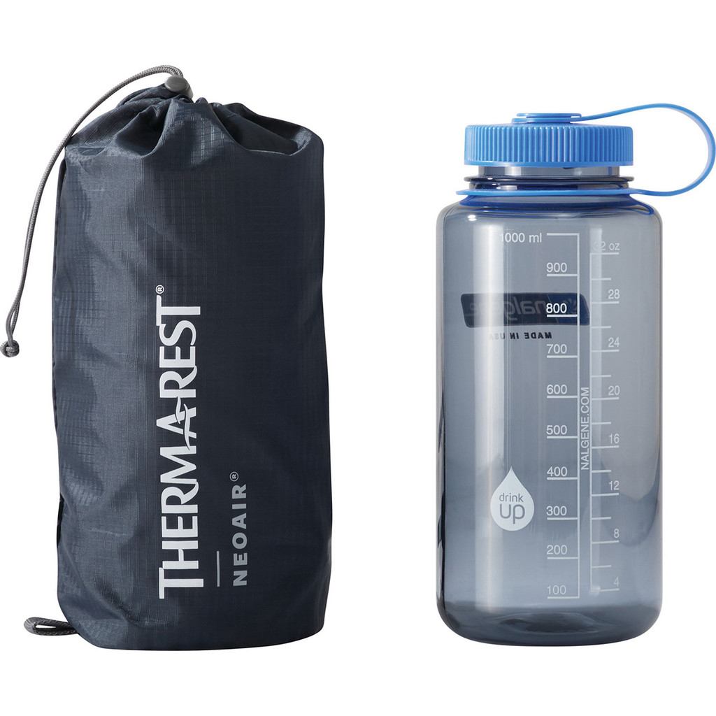 comparison shot of a lightweight, insulated air, comfortable, warm, sleeping pad packaged up to 32 oz water-bottle