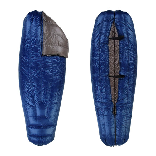 slightly open view of a navy blue shell lightweight down sleeping bag quilt with a charcoal gray interior