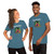 Man and woman wearing matching heather deep teal Enlightened Equipment t-shirts with tent and campfire design
