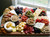 Charcuterie board with meats and cheeses