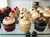 Assorted cupcakes on display