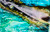 Ocean Tides abstract metal painting inspired by ocean currents with flowing layered blue textures