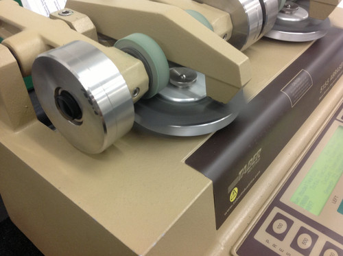 Taber Abrasion Testing per ASTM D4060.