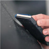 Mirka Dual Density Sanding Block with wet-dry paper wrapped around.