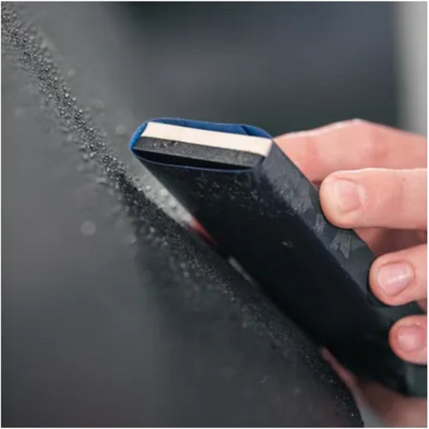 Mirka Dual Density Sanding Block with wet-dry paper wrapped around.