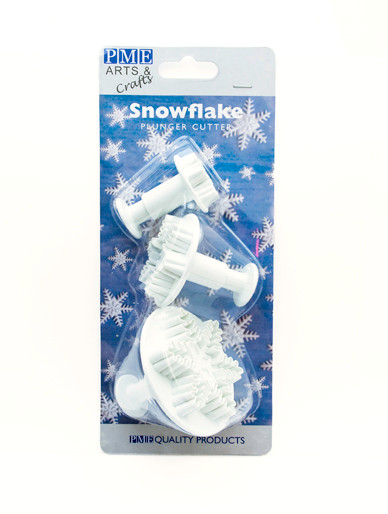 Snowflake plunger cutters shown in retail packaging with branded backing card for Christmas and winter cake decorating tools.