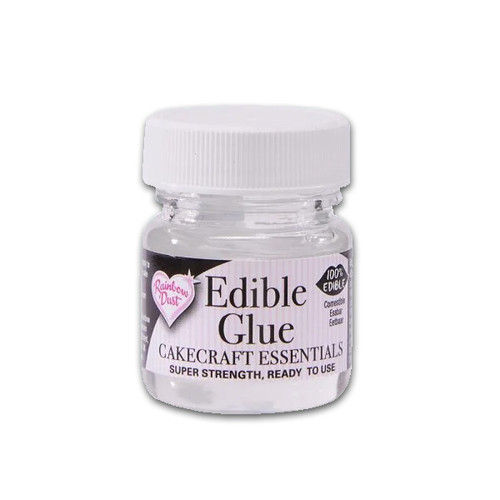 A clear pot of Rainbow Dust edible glue with a white lid.