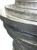 A close up of a stack of 12 inch cake drums showing 12mm thickness.