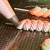 Piping bag with Colour Mill Piping Tip 2C Drop Flower on end
