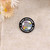 pin badge with daily shit storm survivors club written on it on clothing