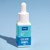 bottle of blue colour drops with blue background
