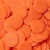 loose orange candy buttons
