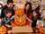 Family Opening Large Halloween Pumpkin Gift Basket Filled with Treats