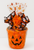 Happy Halloween Haul 8-inch pumpkin gift basket wrapped with festive ghost ribbon and fall pumpkin decorations