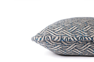 Side View of Woven ‘Tangle’ cushion in indigo tones featuring a textured weave and thick self-piped edge. Using And Objects fabric, made in Belgium. Pattern layout varies by piece.