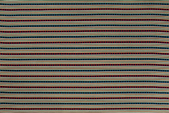 Criss Cross Indoor Woven Fabric in Indigo — a deep blue-toned base with contrasting green stitched cross details, perfect for introducing a bold, refined touch with a playful edge to contemporary interiors.