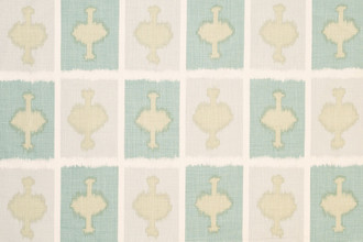 Ozone Printed Fabric in Aqua — a soothing aqua hue with an ikat geometric grid pattern, where the lines gently curve and shift, adding an organic touch to this fresh, vibrant fabric.