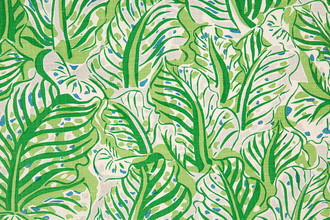Mille Feuilles printed fabric in bright Green, layered with splashes of blue, offering a vibrant take on nature through Dufy’s abstract, flowing leaves.