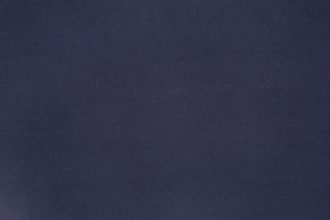 Reef Woven Fabric in Dark Indigo – a deep, rich indigo blue with a sophisticated weave, adding depth and elegance to any room.